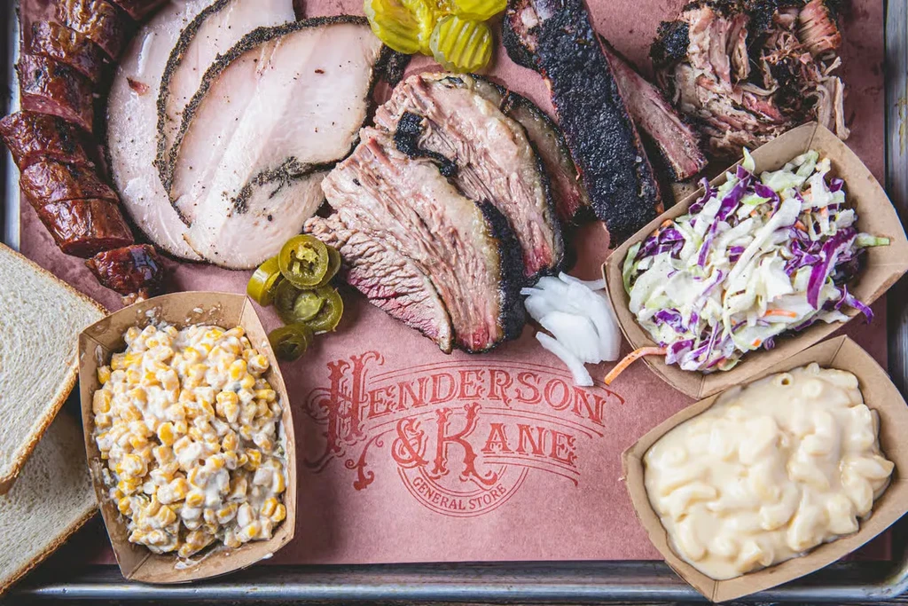 Henderson & Kane General Store barbecue platter with smoked meats and sides.