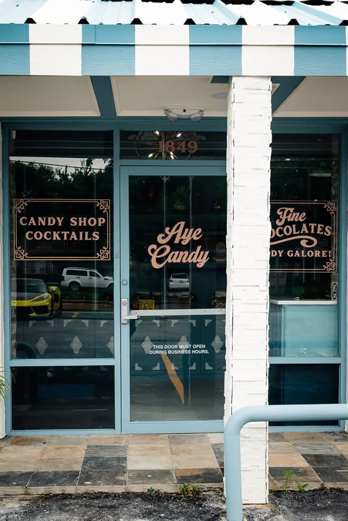 Exterior of a candy shop and cocktail bar named "Aye Candy."