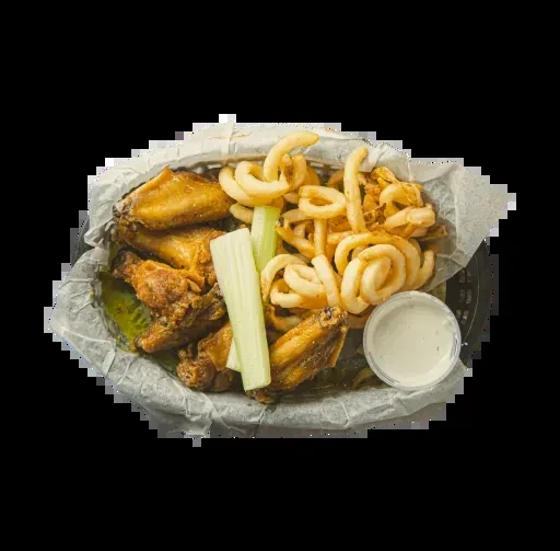 Basket of crispy chicken wings, curly fries, celery, and dip.