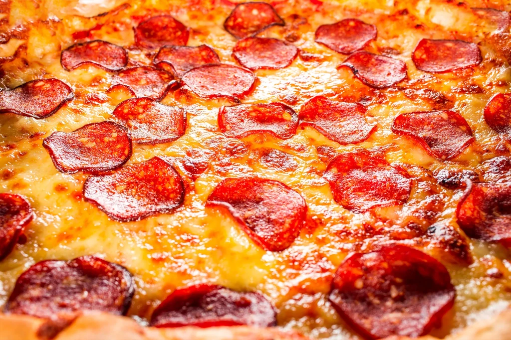 Golden-brown pepperoni pizza with bubbly cheese and crisp pepperoni.
