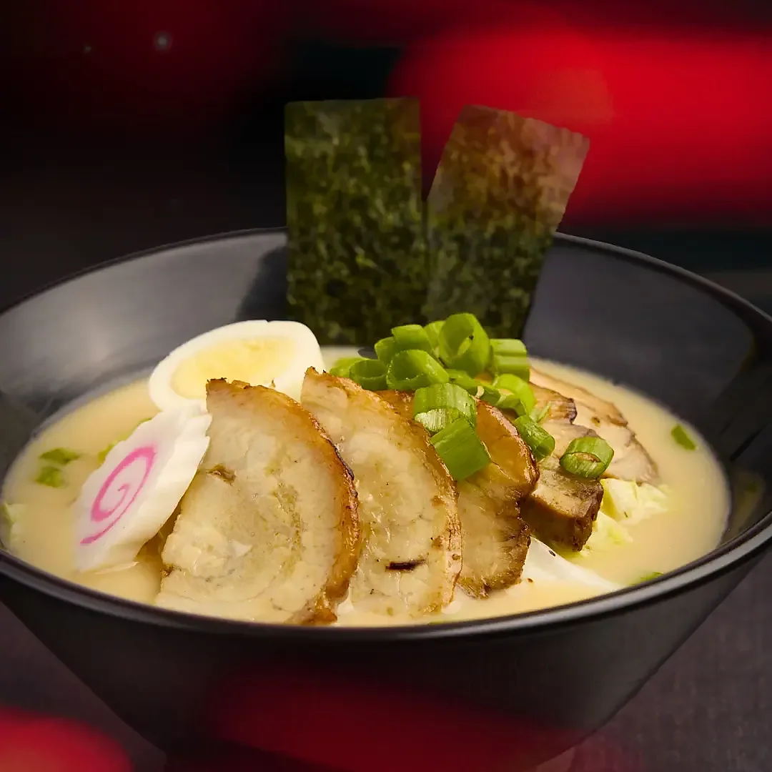 Tonkotsu ramen bowl with chashu pork, egg, scallions and nori