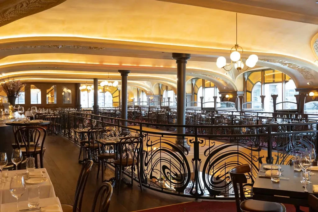 Interior of an empty, multi-level restaurant with luxurious decor.