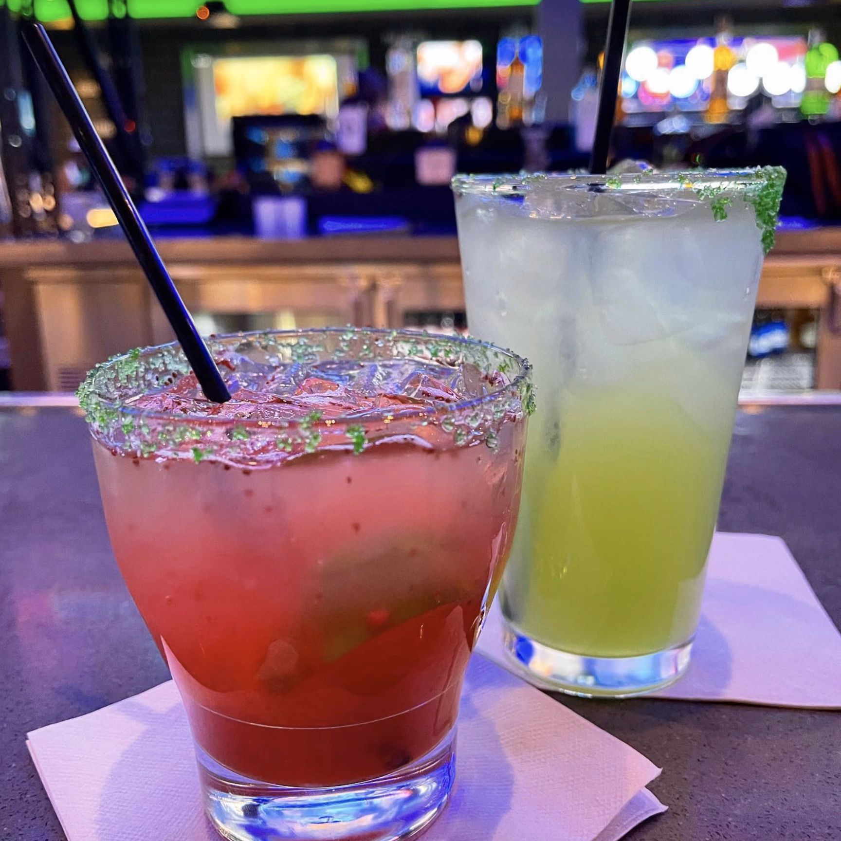 A refreshing lineup of signature cocktails featuring bright tropical flavors.