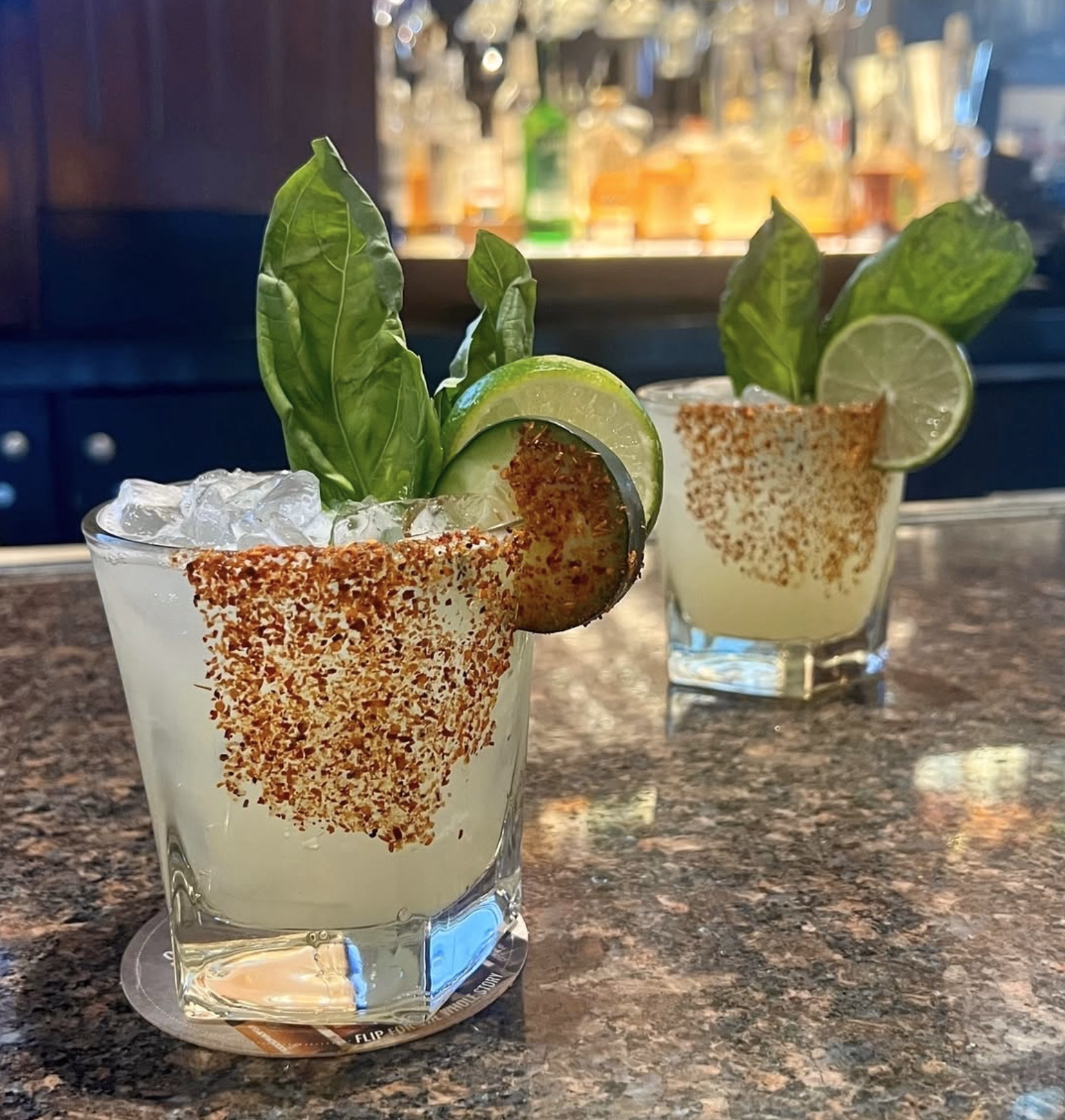 BJ’s refreshing margaritas served with fresh herbs and a chili-salt rim.