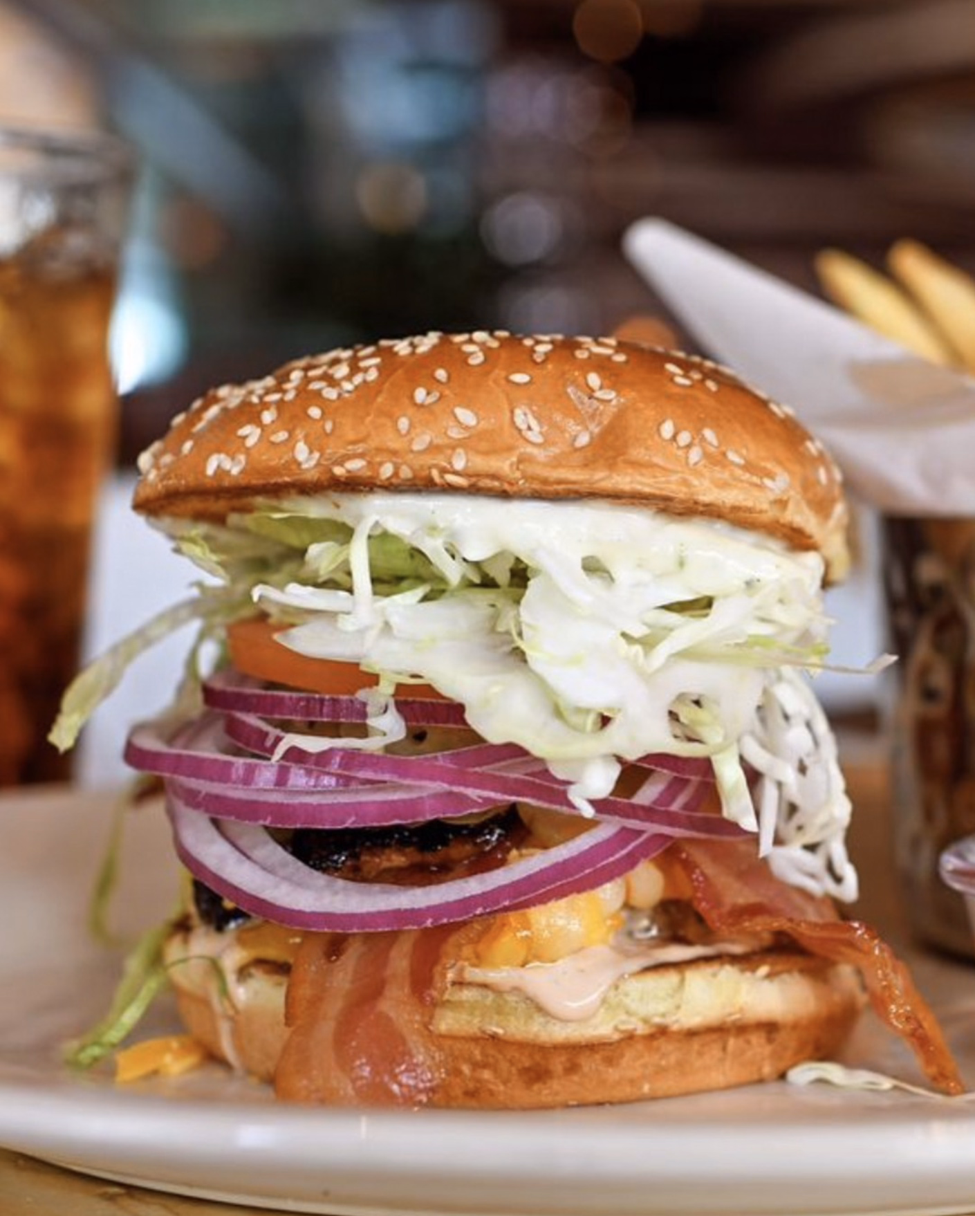 Classic burger with melted cheese, bacon, and crunchy lettuce.