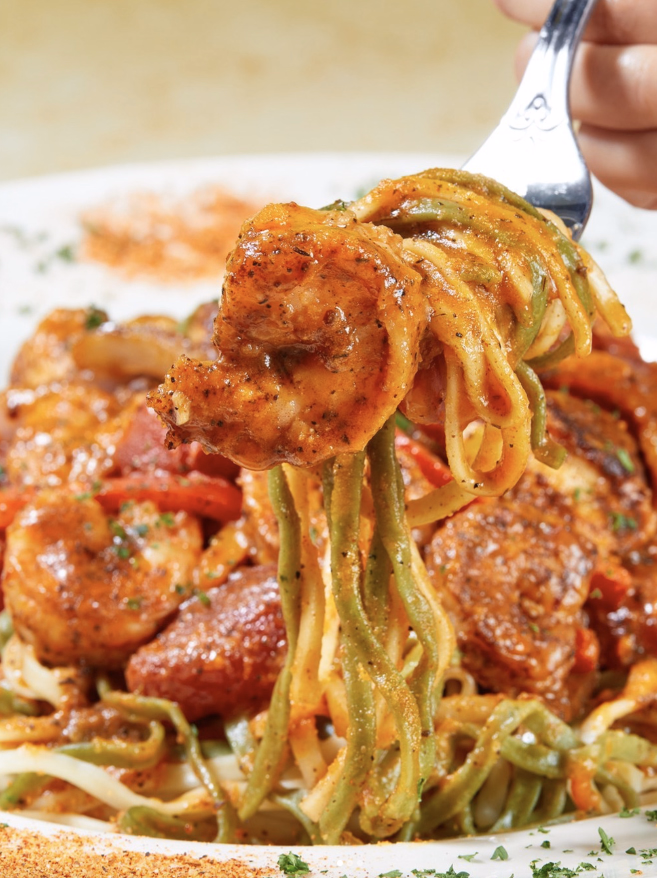 Spicy shrimp and sausage pasta tossed in flavorful Cajun sauce.