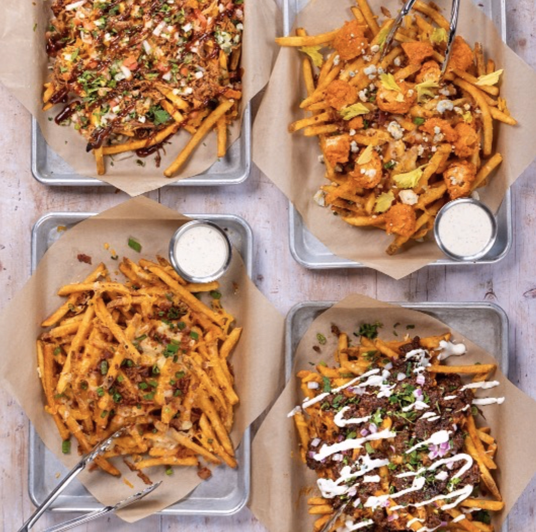 Loaded fries topped with bacon, cheese, ranch, and buffalo chicken.