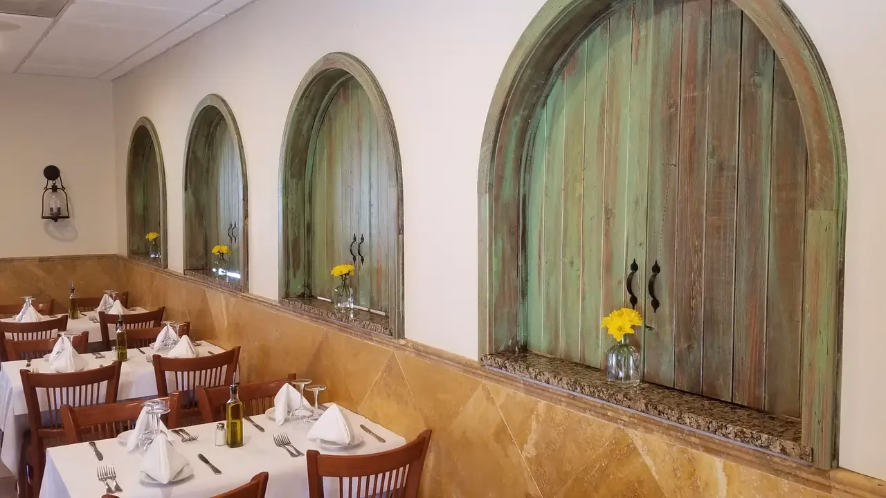 Rosario's Trattoria & Pizzeria logo