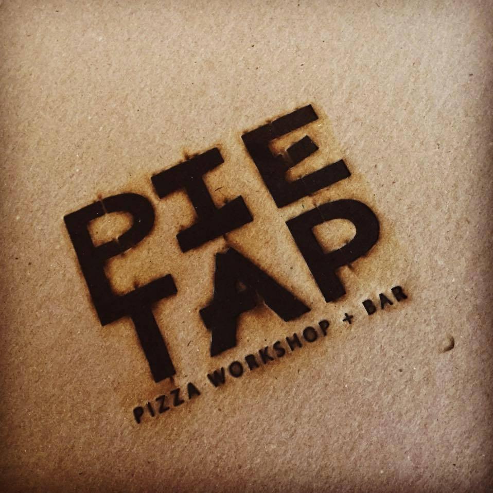 Pie Tap Pizza + Rotisserie + Bar logo