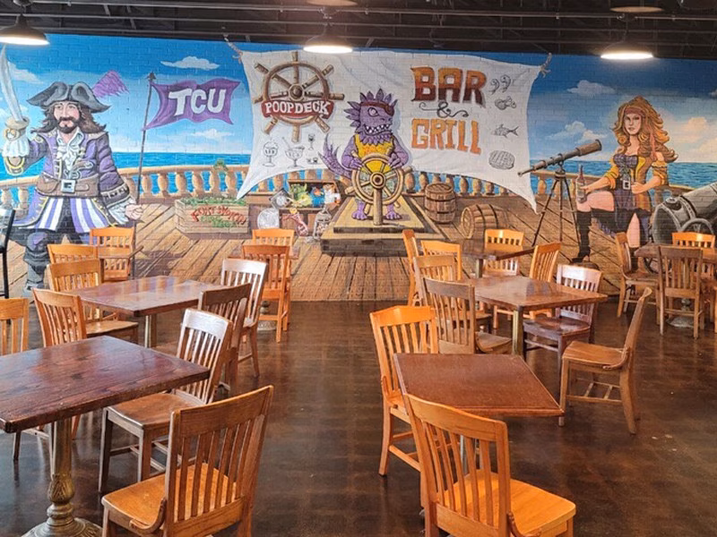 Poop Deck Bar and Grill logo