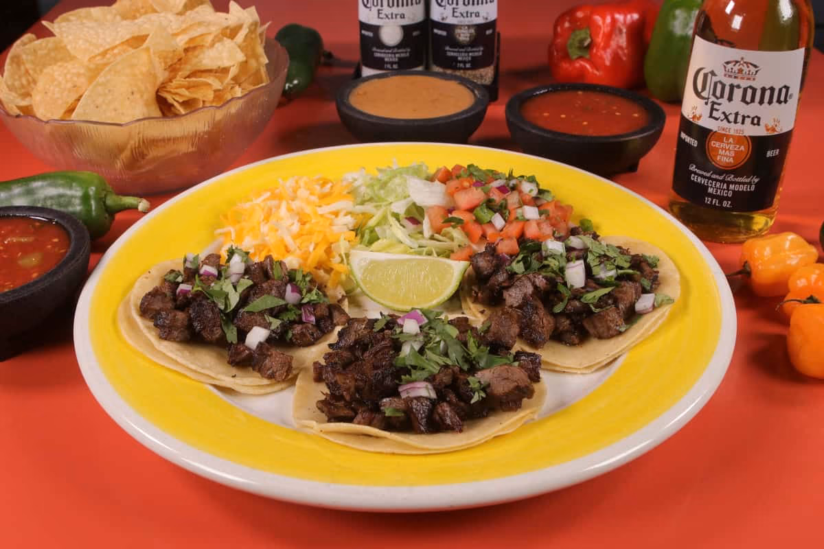 Arriba Mexican Grill logo
