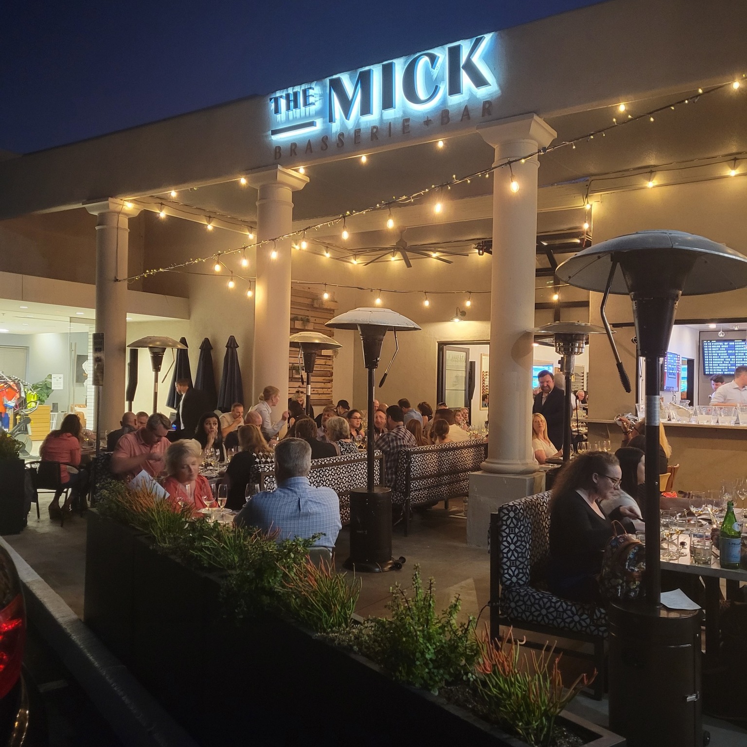 The Mick Brasserie + Bar logo