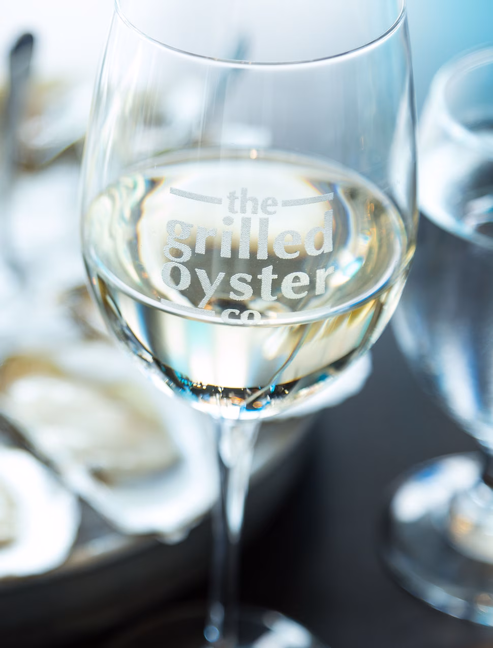 The Grilled Oyster Company logo