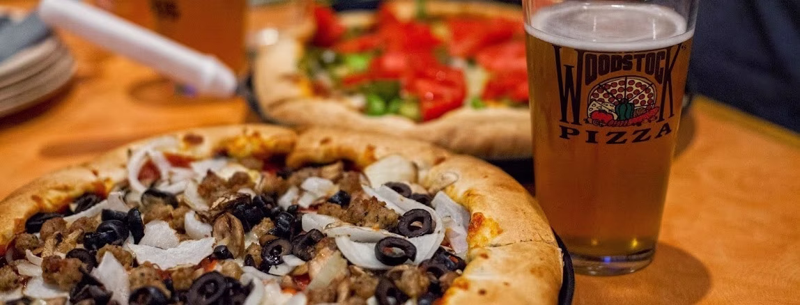 Woodstock's Pizza Pacific Beach logo