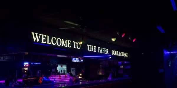 Paper Doll Lounge logo