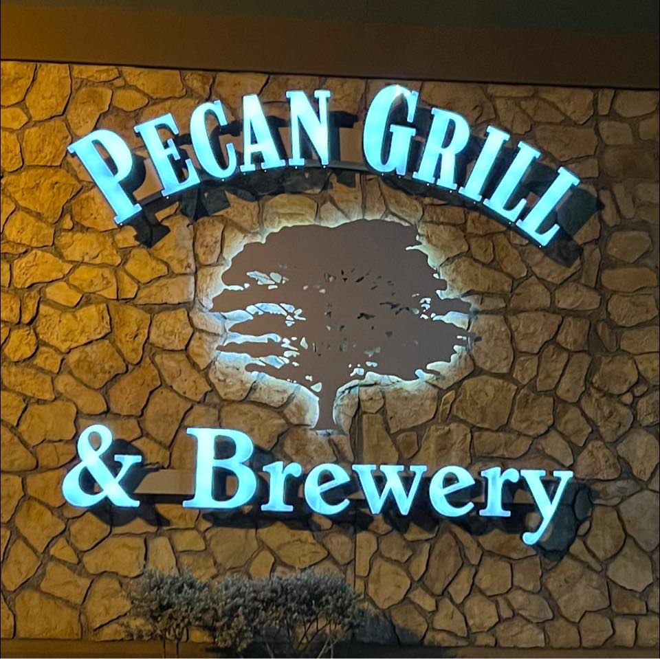 The Pecan Grill and Brewery logo