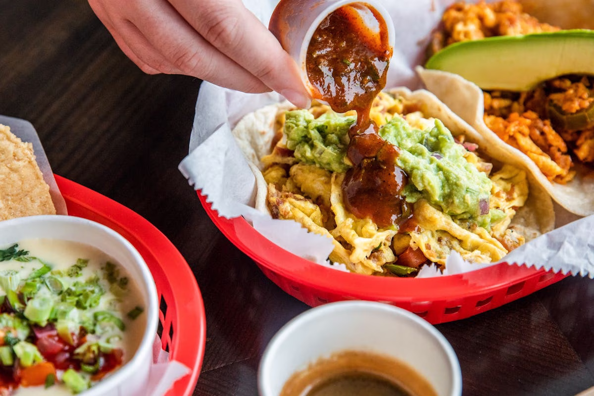 Tacos A Go Go Midtown logo